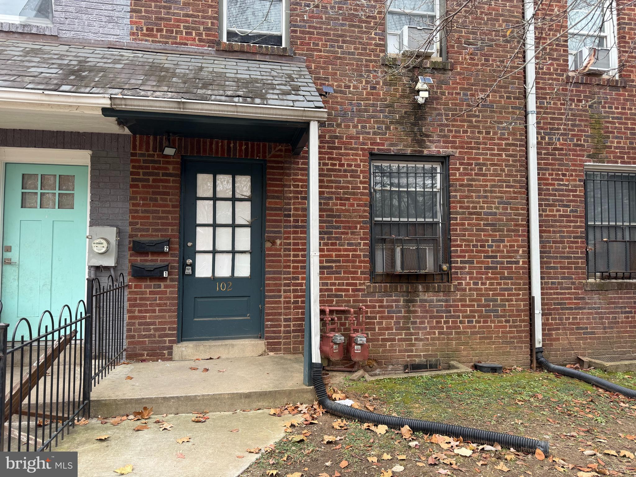 102 O Street Southwest, Unit 1 Washington, DC 20024 - Photo 2 of 10 a view of a brick house with a door