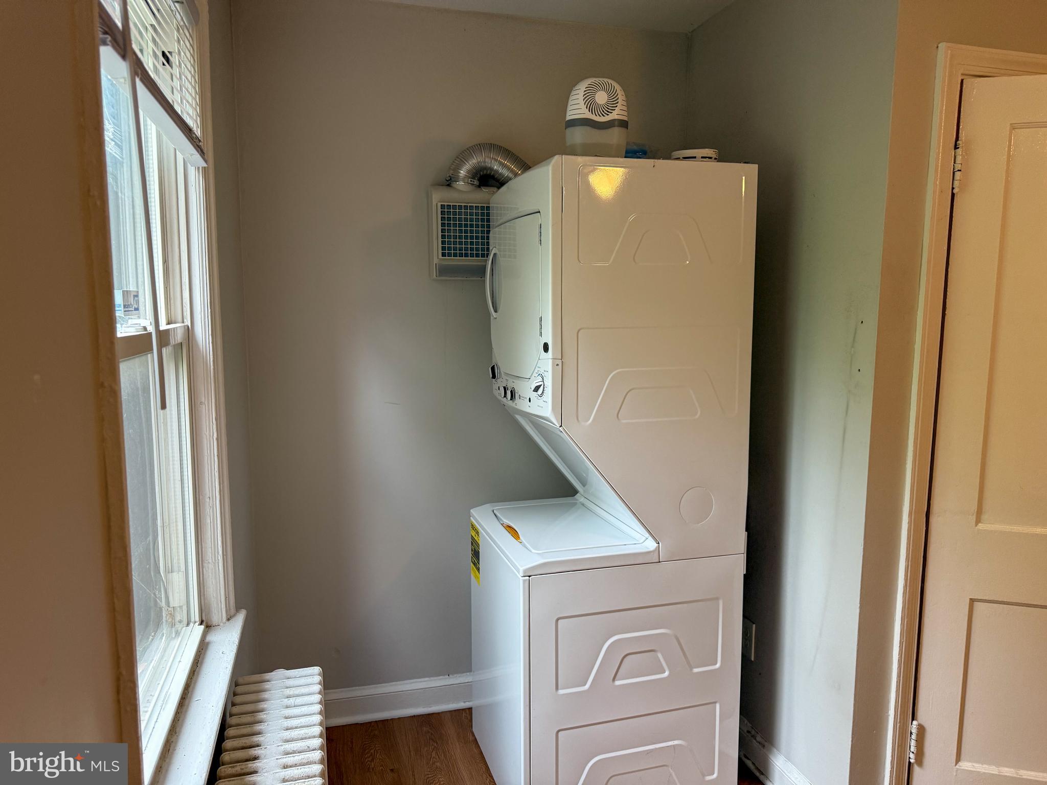 102 O Street Southwest, Unit 1 Washington, DC 20024 - Photo 4 of 7 a utility room with dryer and washer