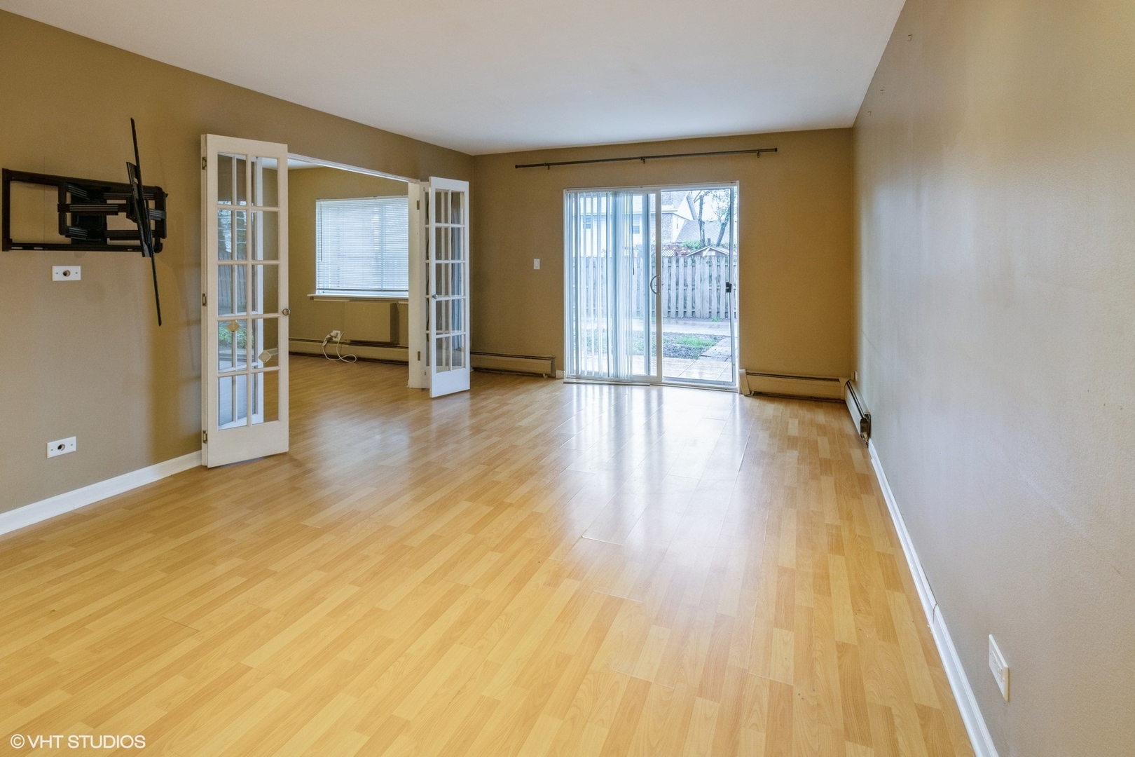 2323 South Goebbert Road, Unit 109 Arlington Heights, IL 60005 - Photo 3 of 11 wooden floor in a room