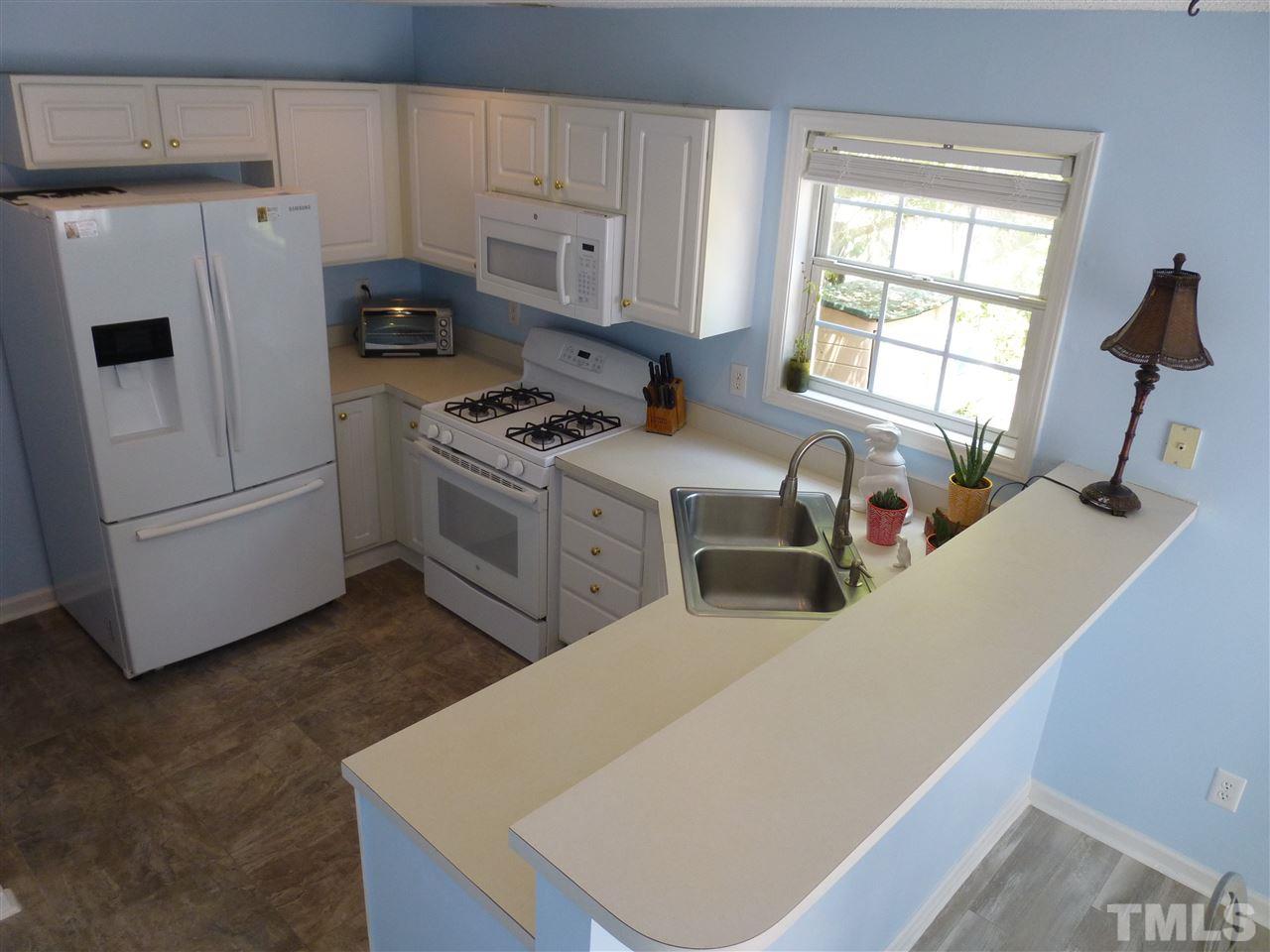 9028 Shallcross Way Raleigh, NC 27617 - Photo 4 of 11