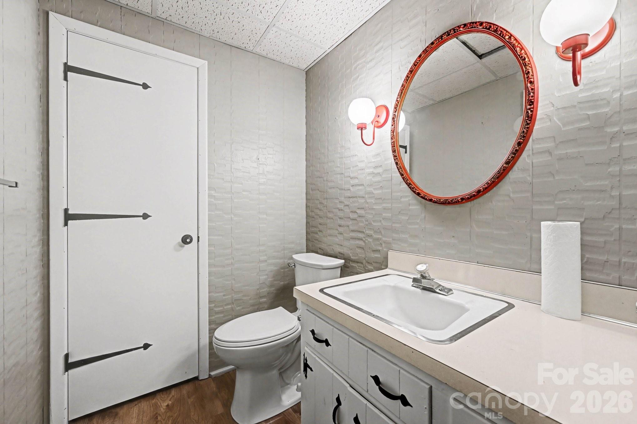 2915 Old Stage Road Gastonia, NC 28052 - Photo 14 of 42 a bathroom with a sink and a mirror