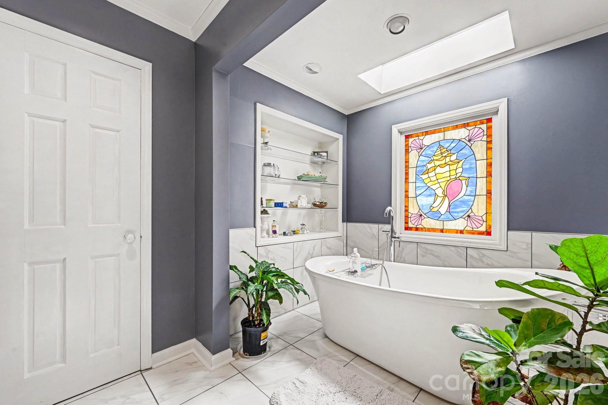 2915 Old Stage Road Gastonia, NC 28052 - Photo 28 of 42 a white bath tub with a window