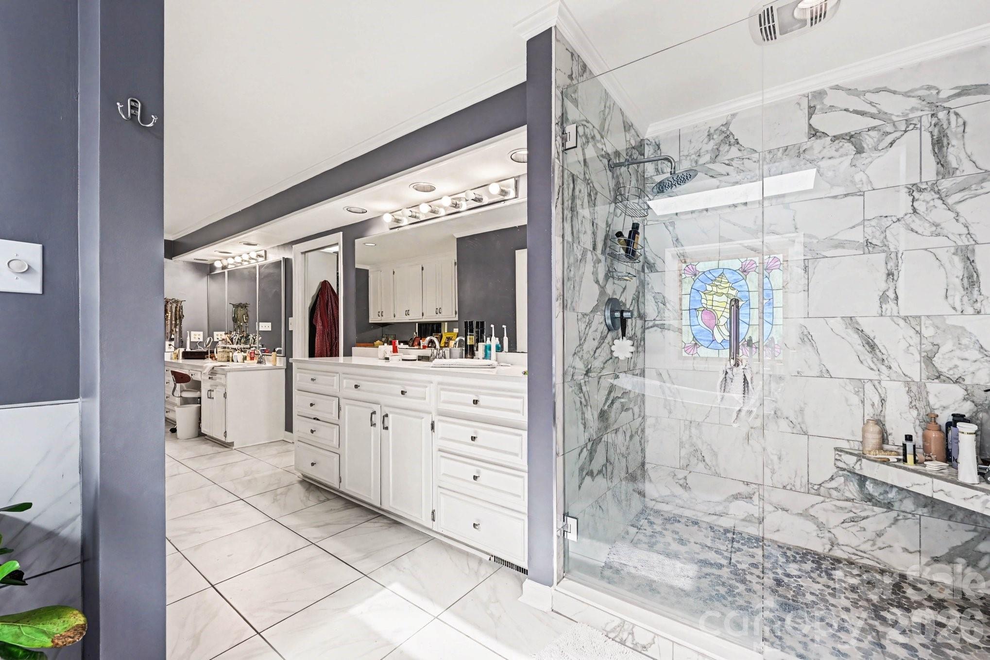 2915 Old Stage Road Gastonia, NC 28052 - Photo 29 of 42 a bathroom with a double vanity sink mirror and shower