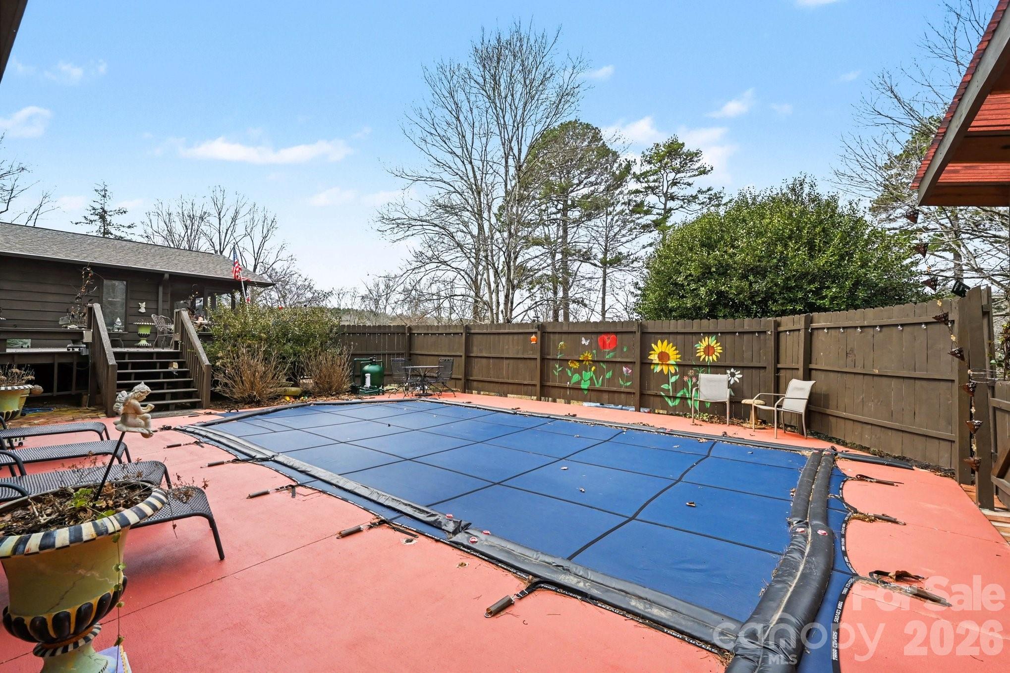 2915 Old Stage Road Gastonia, NC 28052 - Photo 31 of 42 a view of a backyard with sitting area