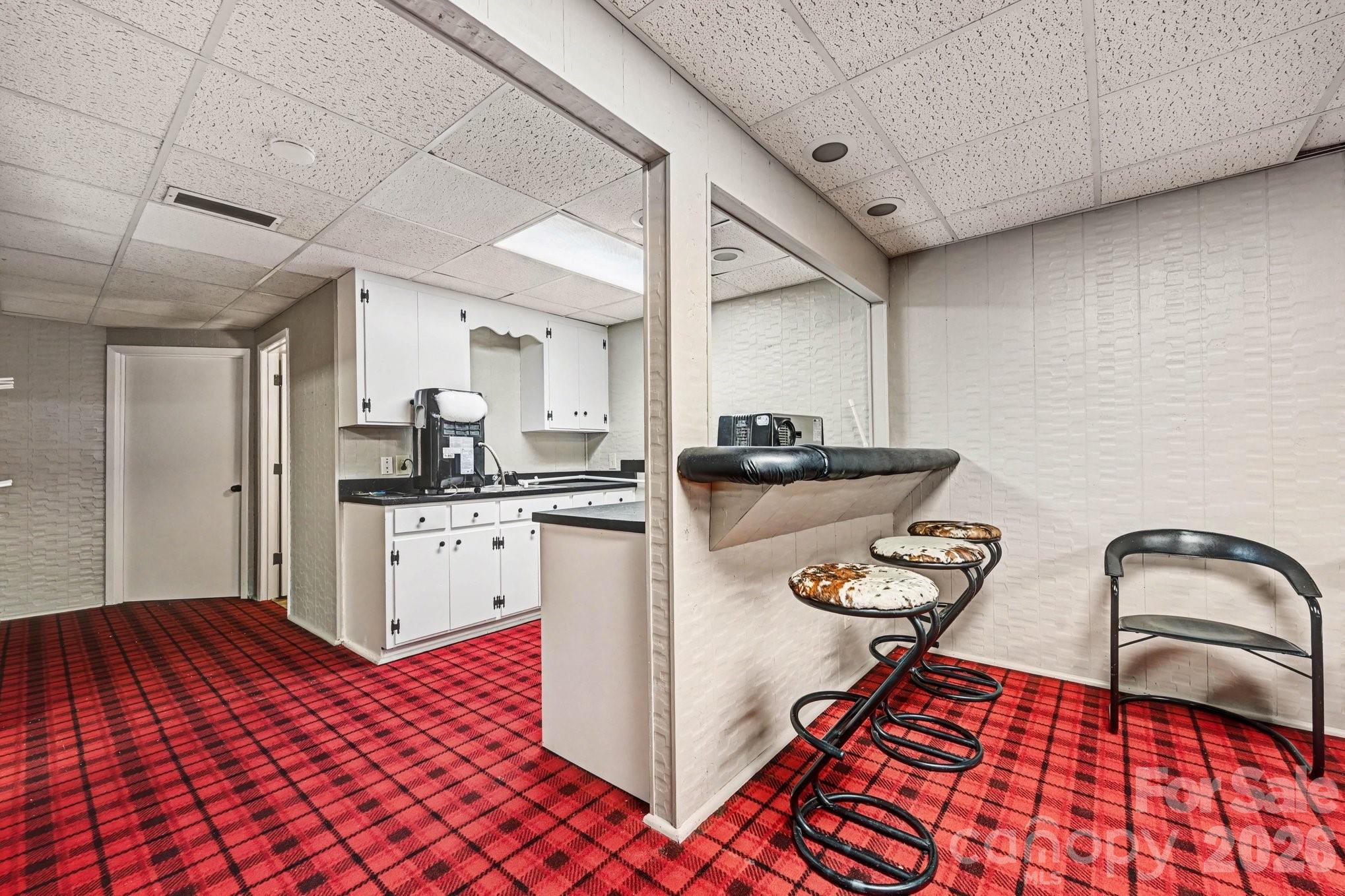 2915 Old Stage Road Gastonia, NC 28052 - Photo 34 of 42 a kitchen with a sink appliances and cabinets