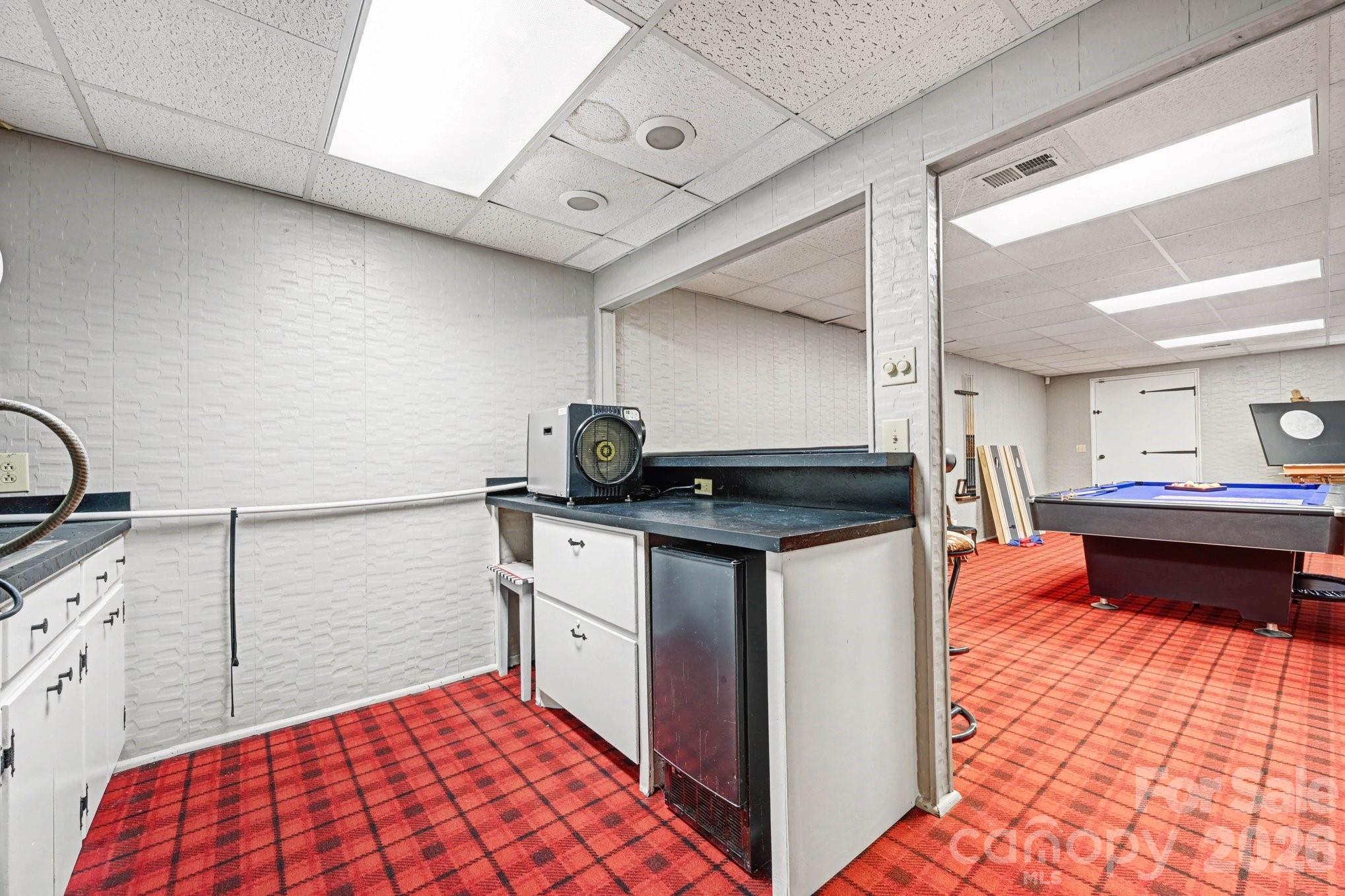 2915 Old Stage Road Gastonia, NC 28052 - Photo 35 of 42 a kitchen with stainless steel appliances granite countertop a sink stove and cabinets