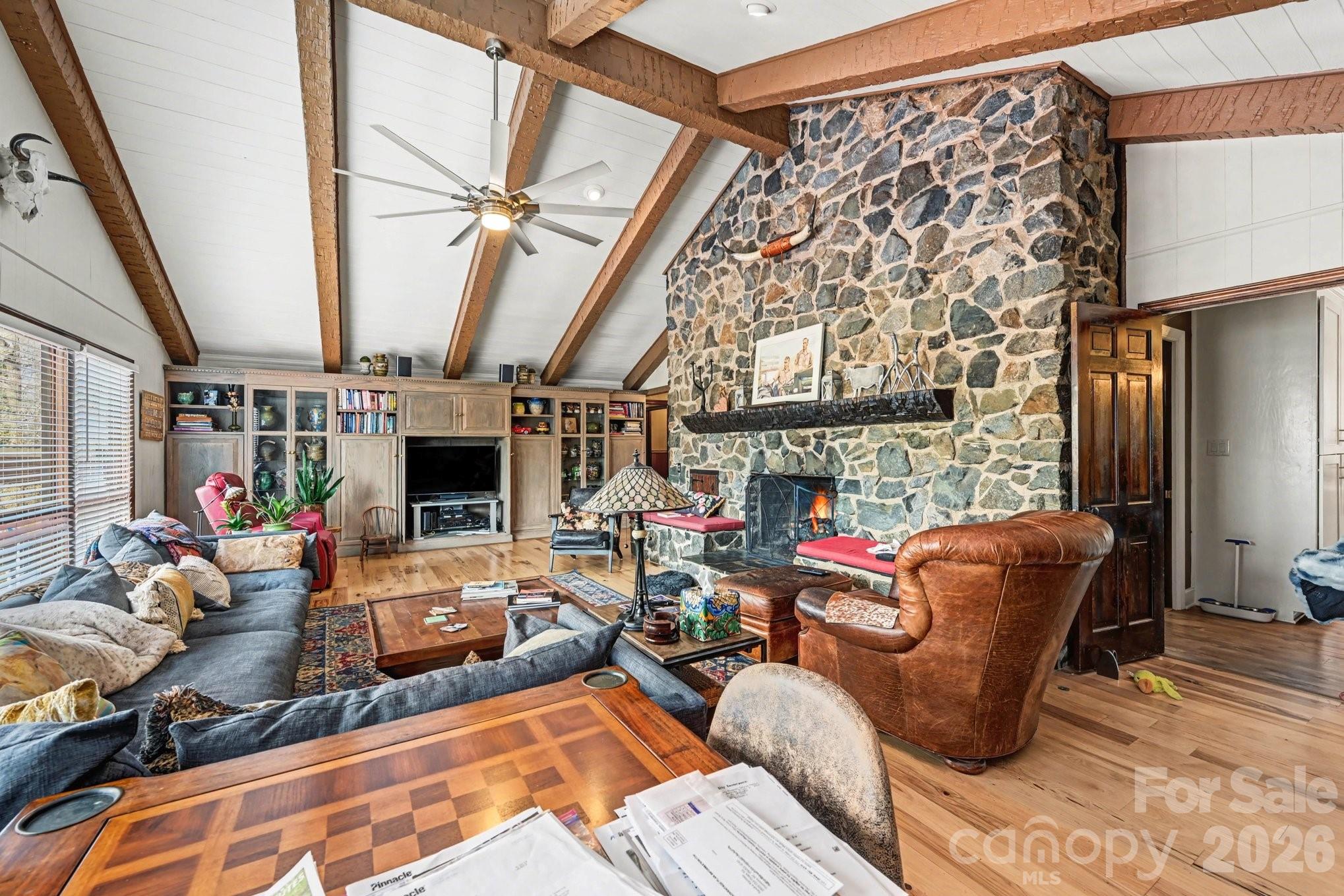 2915 Old Stage Road Gastonia, NC 28052 - Photo 5 of 42 a living room with furniture fireplace and a flat screen tv