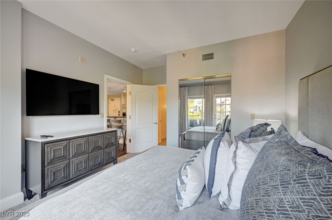 30 Strada Di Villaggio, Unit 250 Henderson, NV 89011 - Photo 15 of 52 Bedroom featuring access to exterior
