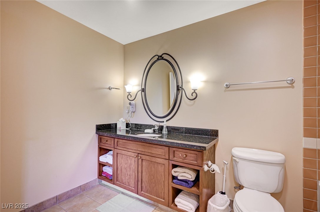 30 Strada Di Villaggio, Unit 250 Henderson, NV 89011 - Photo 19 of 52 Full bath featuring vanity and light tile patterned flooring