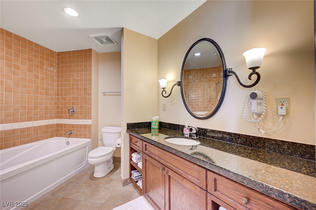 30 Strada Di Villaggio, Unit 250 Henderson, NV 89011 - Photo 23 of 52 Full bath featuring light tile patterned floors, vanity, shower / washtub combination, and recessed lighting