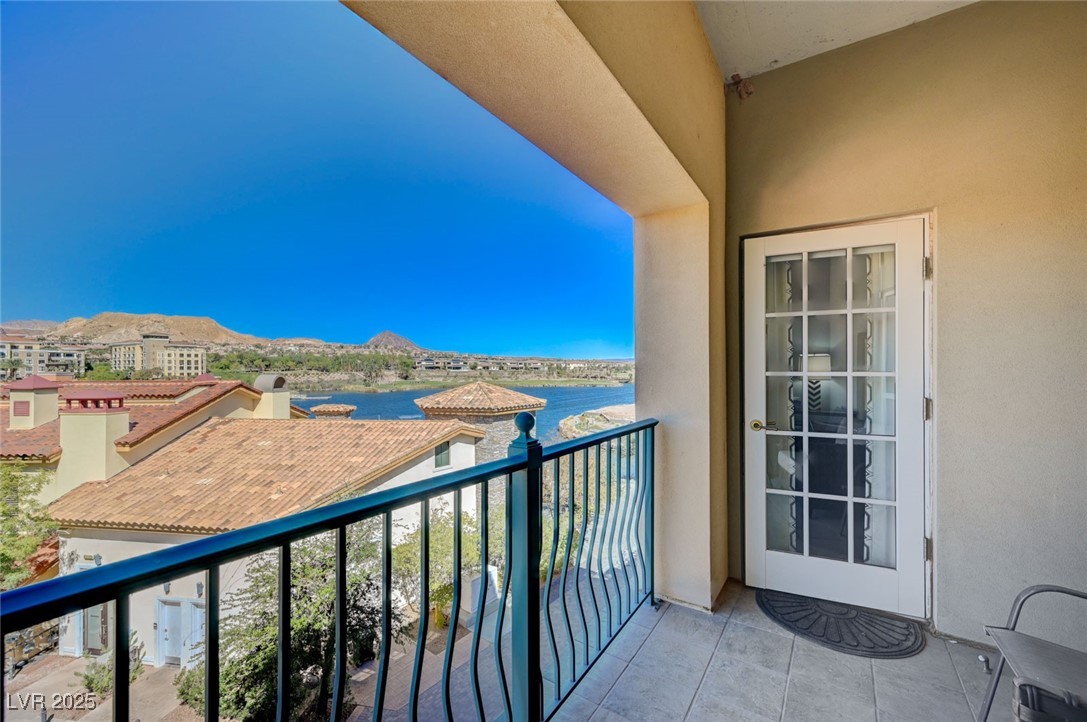 30 Strada Di Villaggio, Unit 250 Henderson, NV 89011 - Photo 31 of 52 Balcony with a water and mountain view