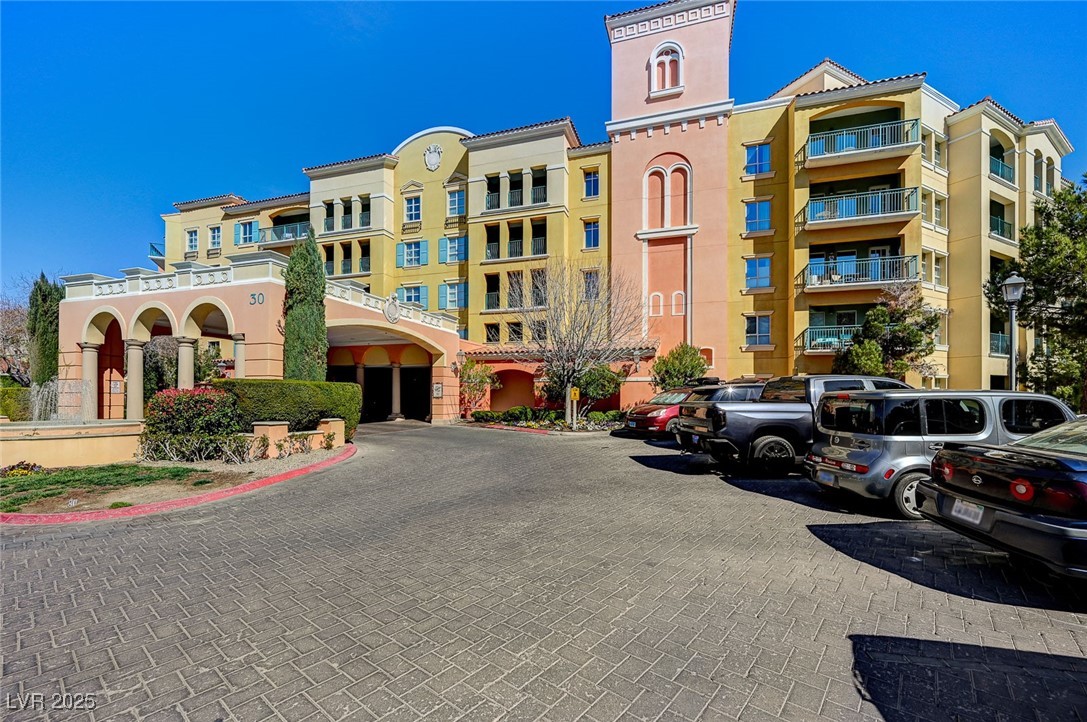 30 Strada Di Villaggio, Unit 250 Henderson, NV 89011 - Photo 39 of 52 View of apartment building / complex featuring uncovered parking
