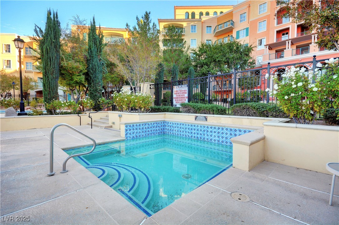 30 Strada Di Villaggio, Unit 250 Henderson, NV 89011 - Photo 42 of 52 View of pool with a patio
