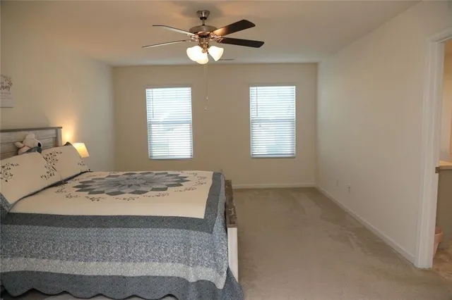 a view of a bedroom with a window