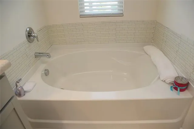 a bathroom with a bathtub