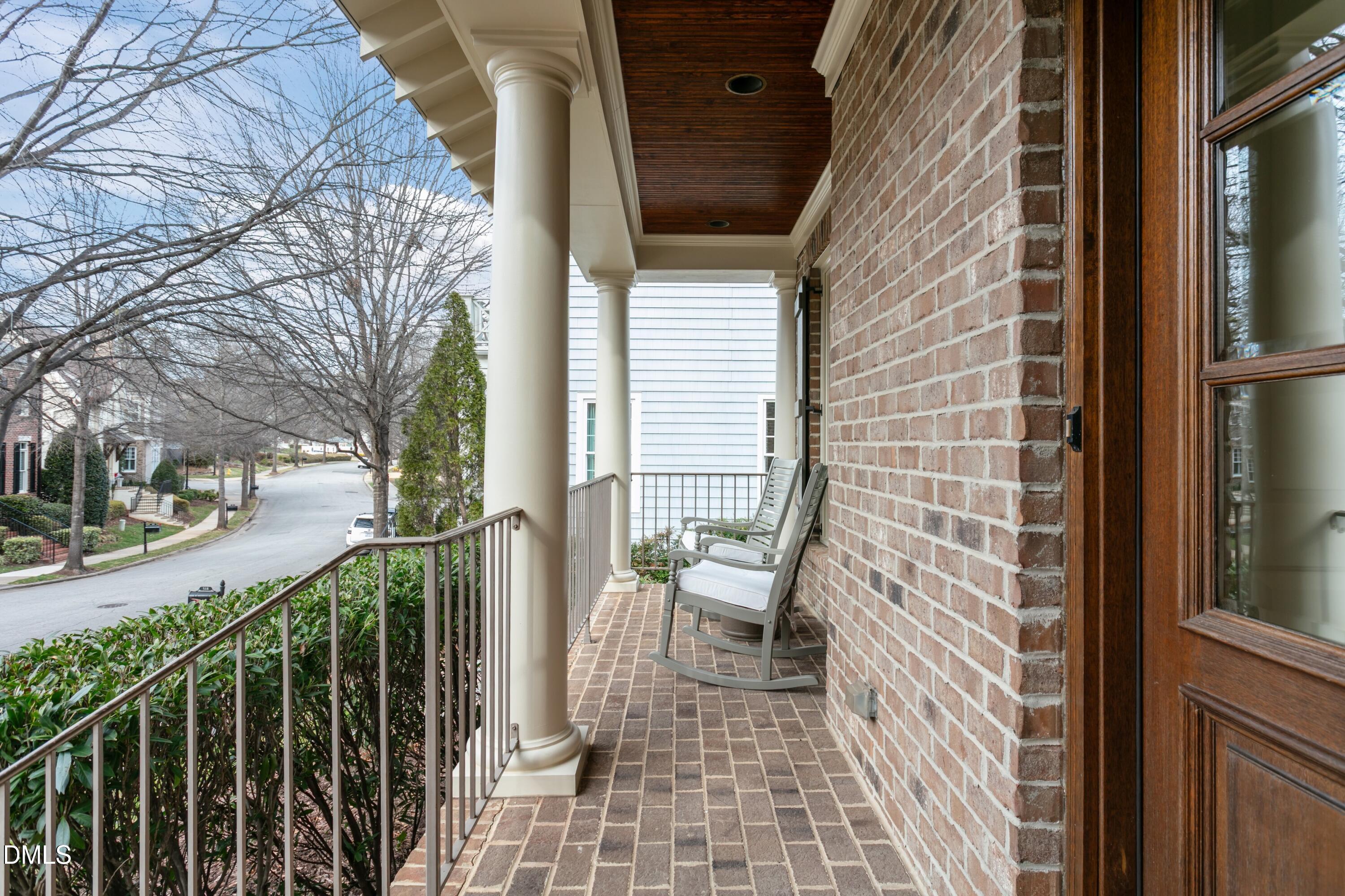 514 Wayne Drive Raleigh, NC 27608 - Photo 3 of 53 a view of a door with a bench