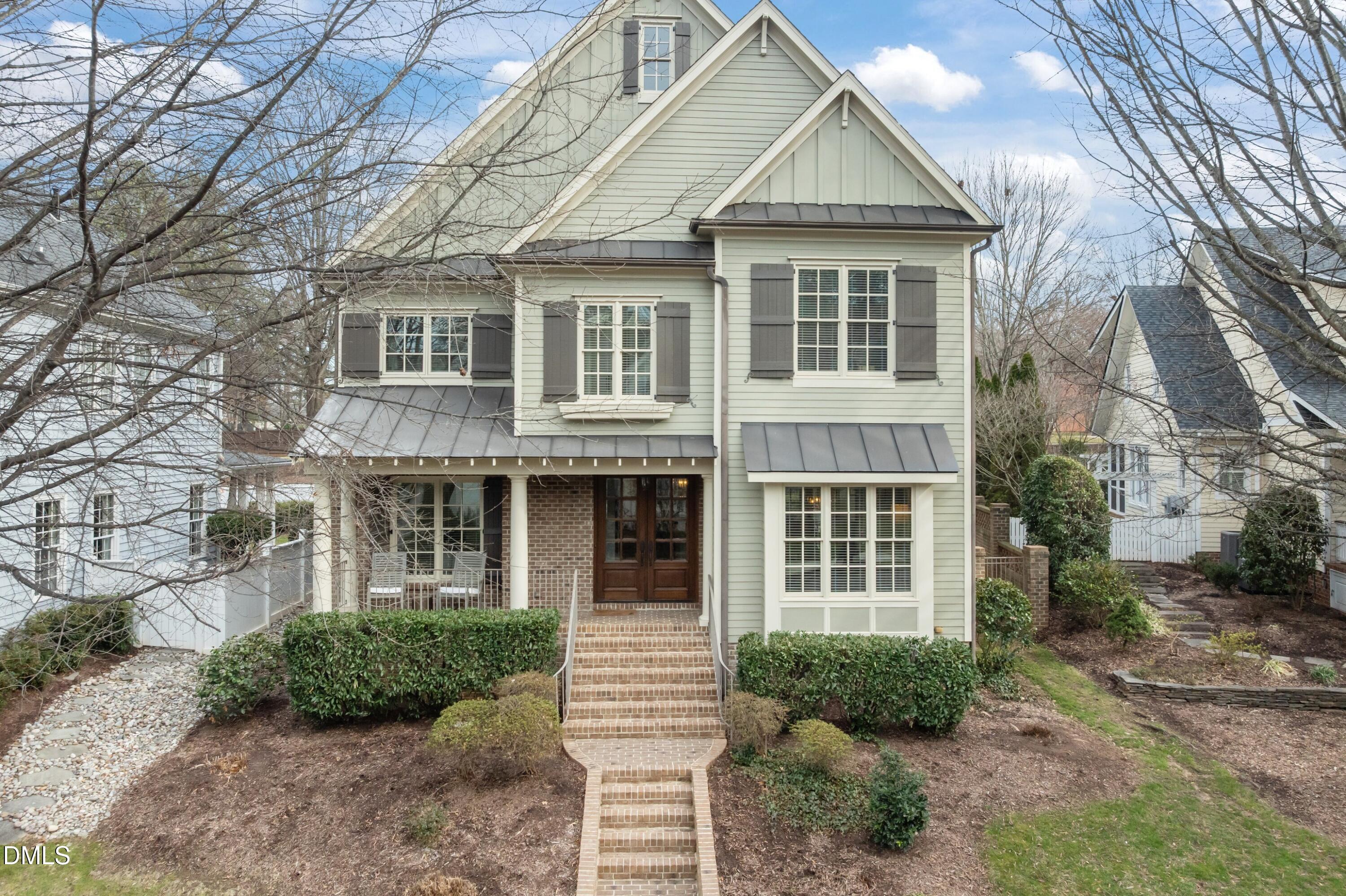 514 Wayne Drive Raleigh, NC 27608 - Photo 52 of 53 a front view of a house with a yard