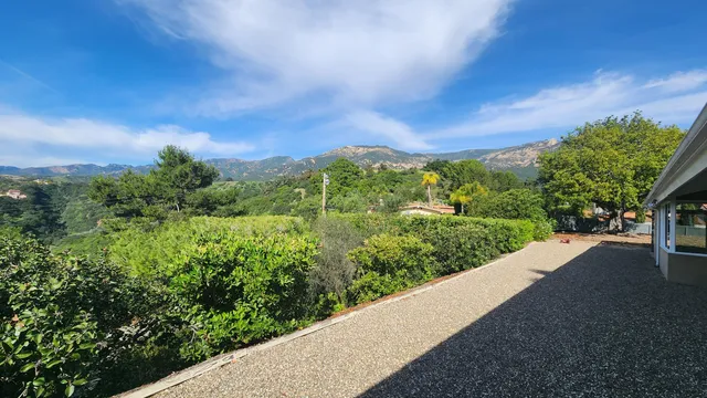 a view of a city street from a balcony