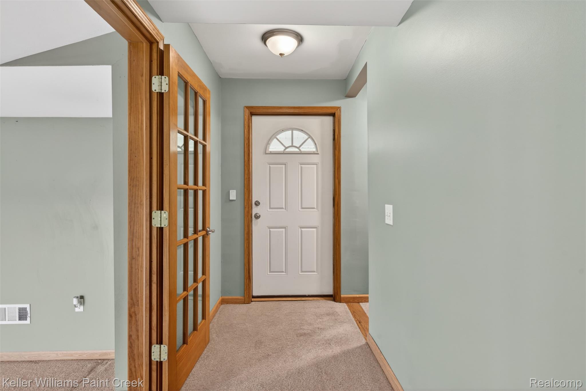 18125 Nelson Road St. Charles, MI 48655 - Photo 21 of 63 Entryway with carpet and baseboards