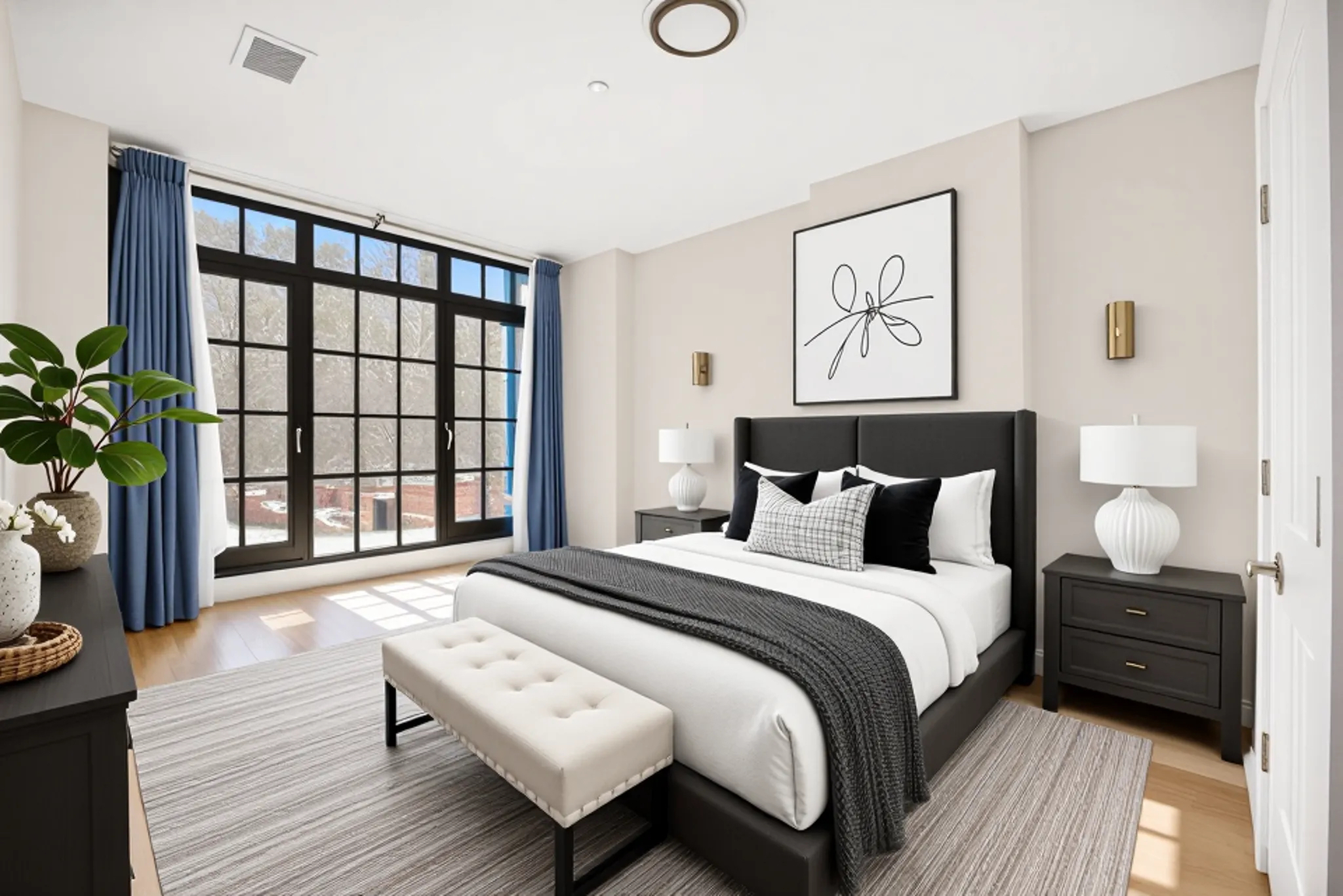 37-24 30th Street, Unit 2F Queens, NY 11101 - Photo 5 of 12 a bedroom with a bed and a large window