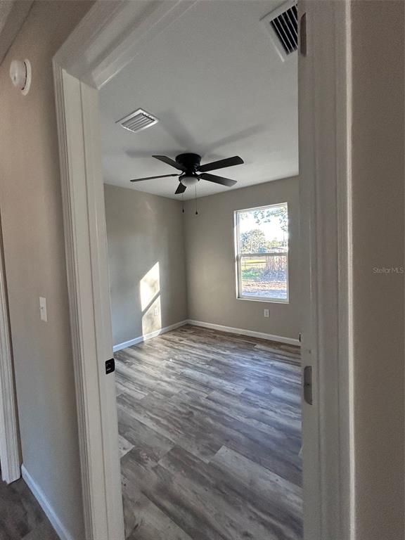 570 Southwest 5th Street Lake Butler, FL 32054 - Photo 7 of 11 a view of an empty room and window