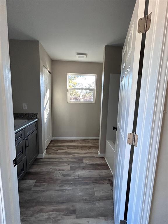 570 Southwest 5th Street Lake Butler, FL 32054 - Photo 9 of 11 a view of an entryway with wooden floor and staircase