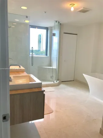 a view of livingroom with washer and dryer