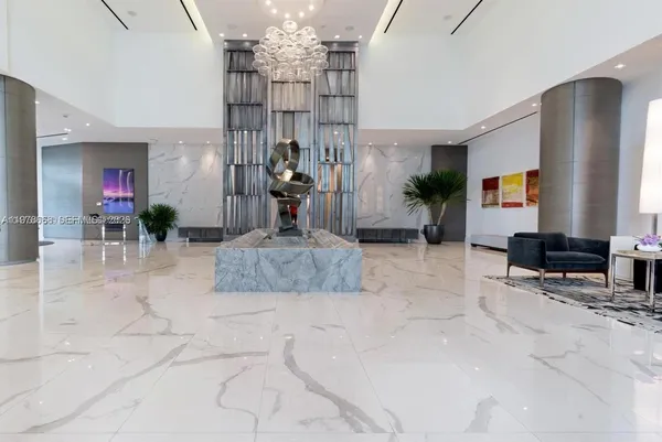 a view of a car parked in front of a house