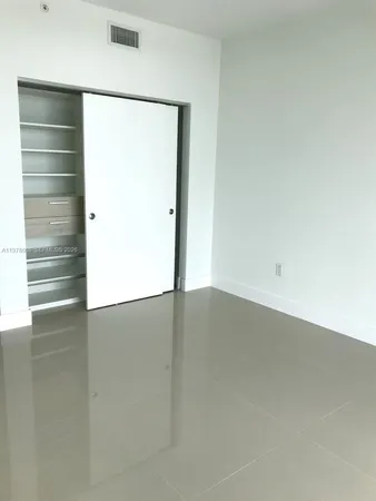 a view of a room with an empty wall