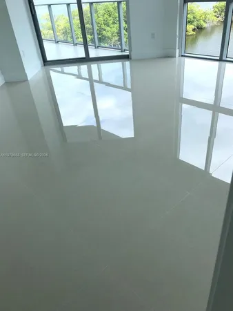 view of an empty room with a window