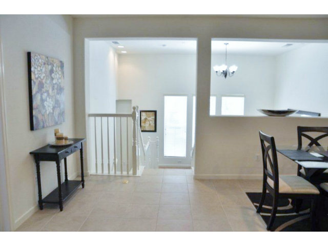 1797 Snell Place Milpitas, CA 95035 - Photo 12 of 25 a bathroom with a sink a mirror and a toilet