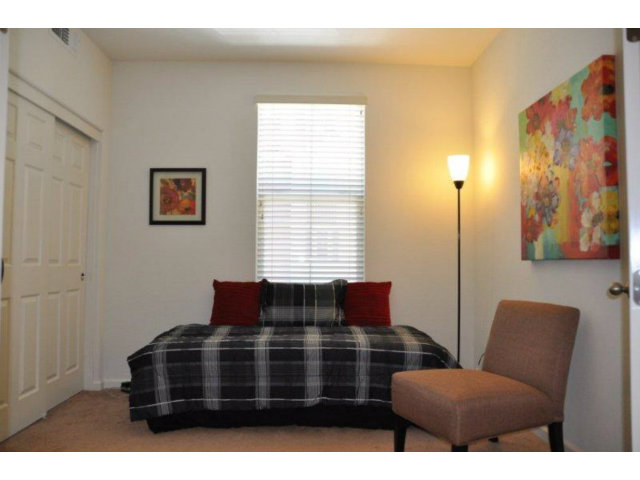 1797 Snell Place Milpitas, CA 95035 - Photo 13 of 25 a bedroom with a bed and window
