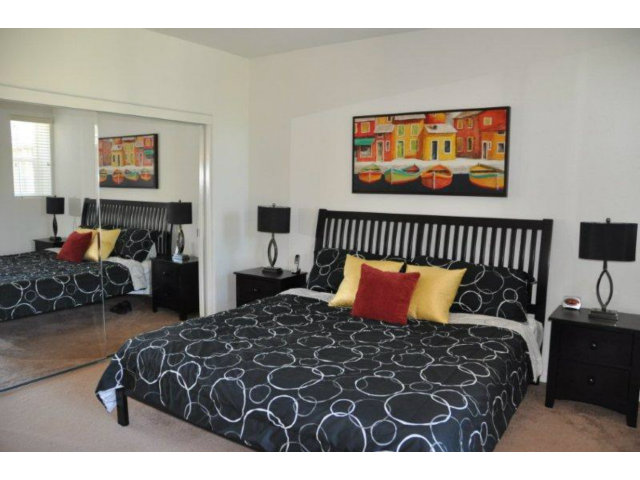 1797 Snell Place Milpitas, CA 95035 - Photo 15 of 25 a bedroom with a bed and window