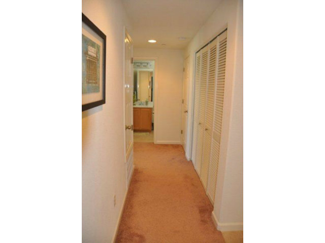 1797 Snell Place Milpitas, CA 95035 - Photo 18 of 25 a view of a hallway with a white walls