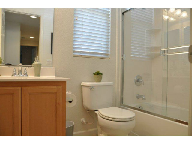 1797 Snell Place Milpitas, CA 95035 - Photo 21 of 25 a bathroom with a sink a toilet and shower