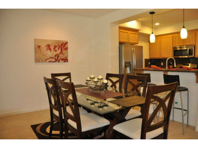 1797 Snell Place Milpitas, CA 95035 - Photo 9 of 25 a view of a dining room with furniture and chandelier