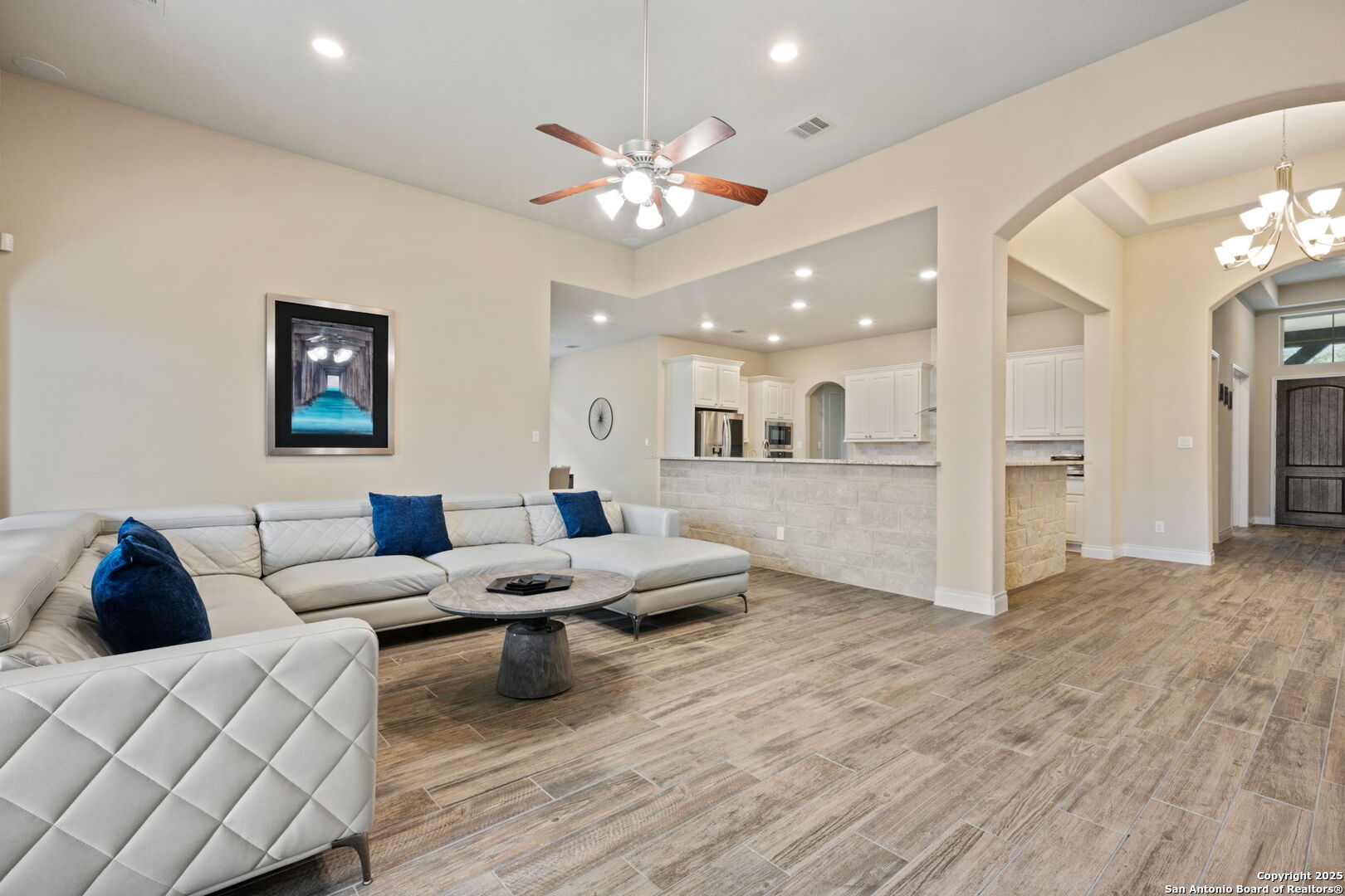7938 Cibolo Boerne, TX 78015 - Photo 11 of 37 a living room with furniture and a view of kitchen