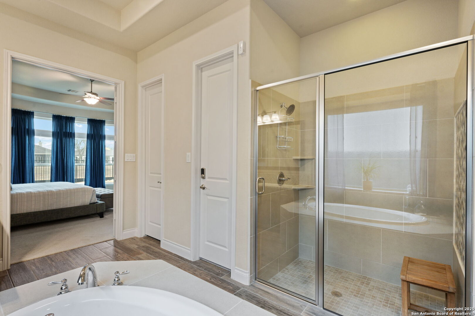 7938 Cibolo Boerne, TX 78015 - Photo 24 of 37 a en suite bathroom with a shower and a glass door
