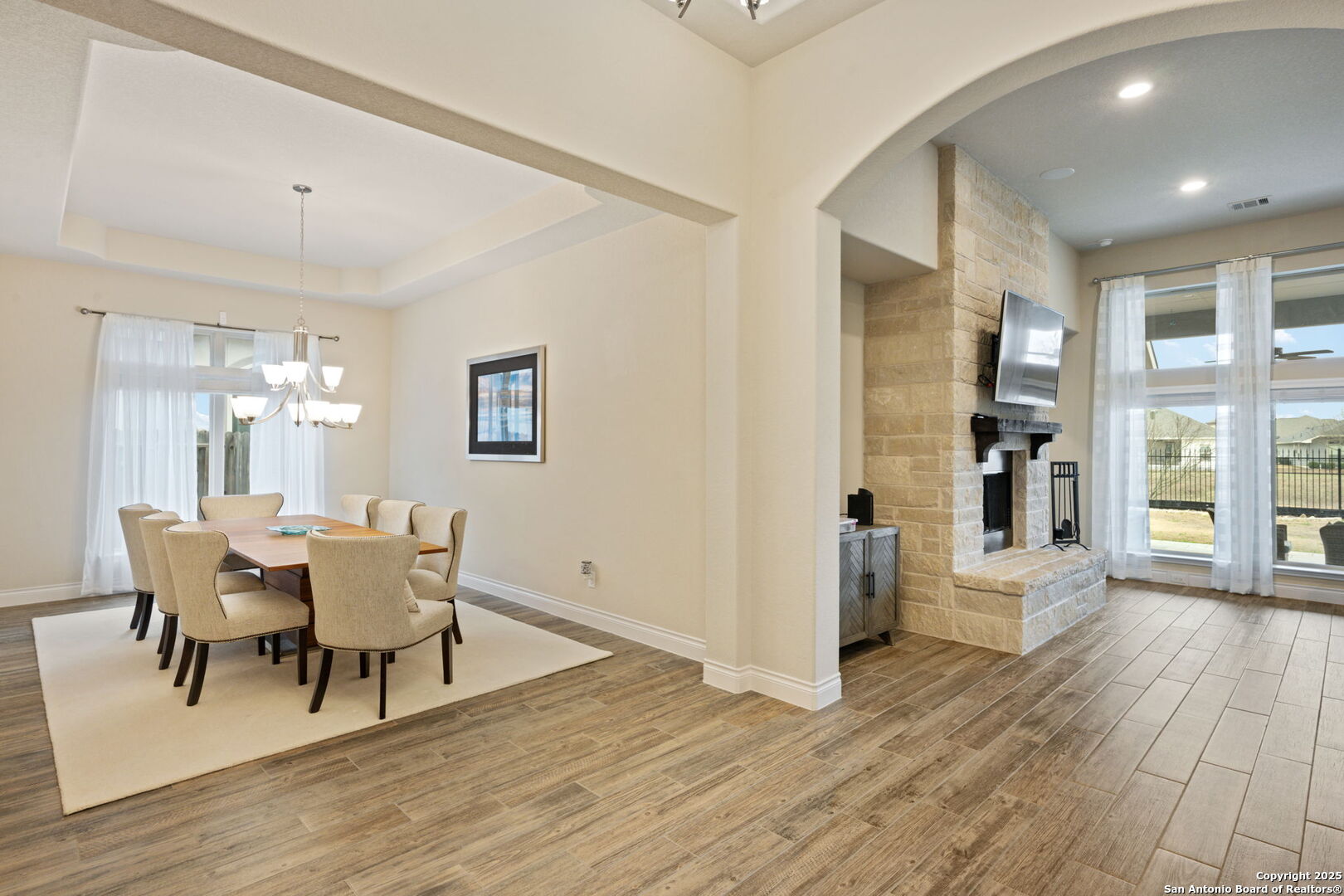7938 Cibolo Boerne, TX 78015 - Photo 7 of 37 a dining room with furniture and wooden floor