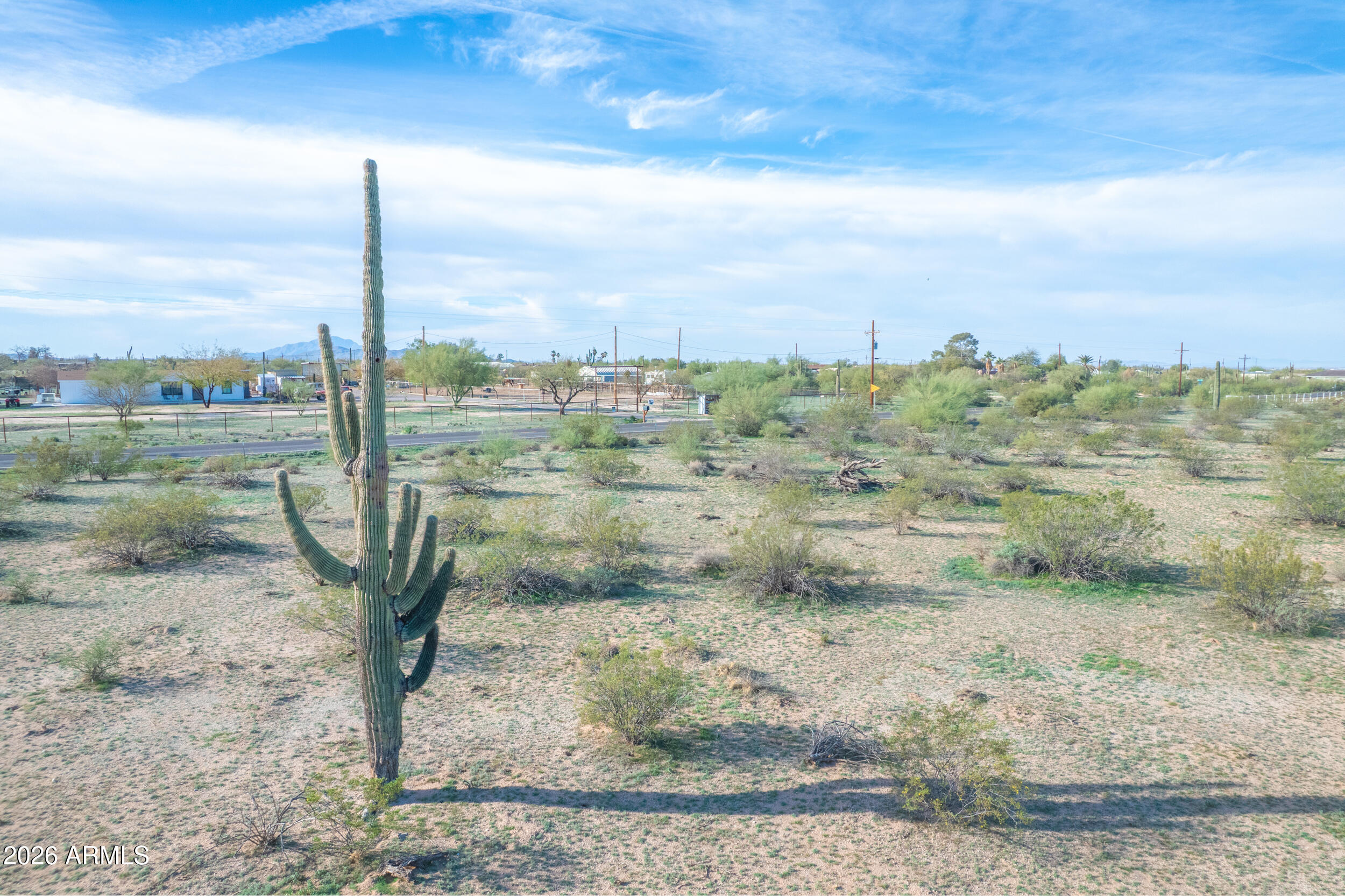1850 East Cactus Forest Road Florence, AZ 85132 - Photo 7 of 36 a view of a dry yard with wooden fence