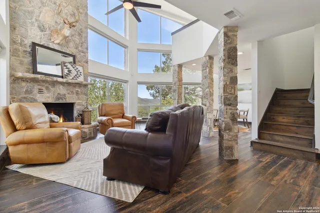 a kitchen with stainless steel appliances a stove and cabinets