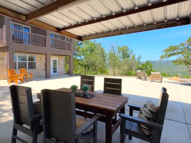 a view of a city with green space