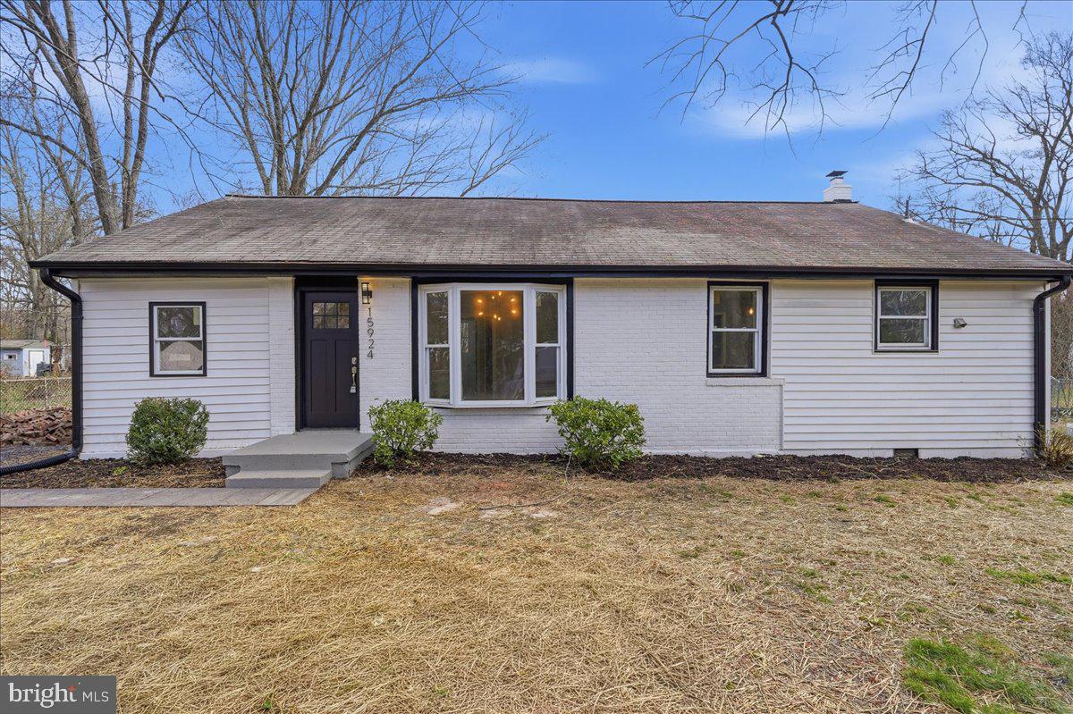 15924 Dusty Lane Accokeek, MD 20607 - Photo 17 of 22 a front view of a house with garden