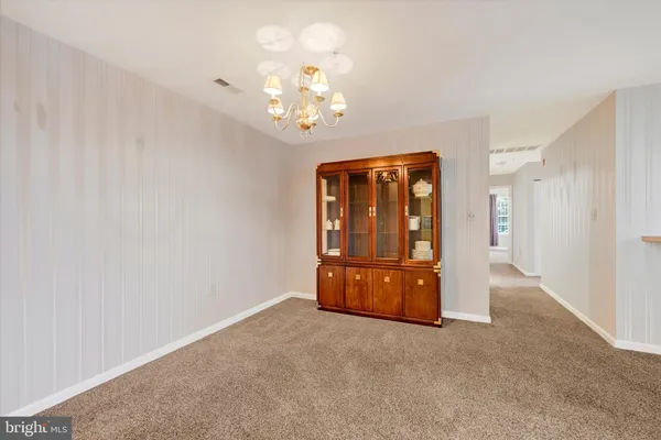 a view of a livingroom with a chandelier