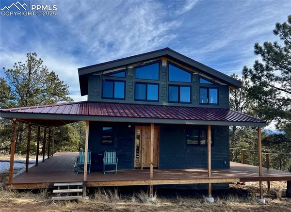 a view of a house with roof deck