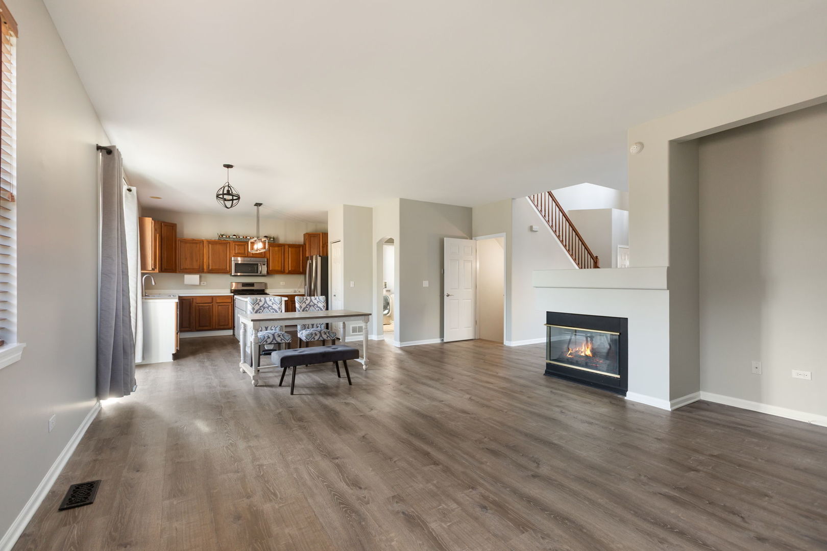 2020 Spring Creek Lane McHenry, IL 60050 - Photo 4 of 17 a living room with furniture and a fireplace