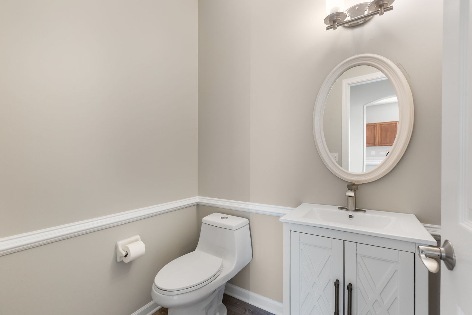 2020 Spring Creek Lane McHenry, IL 60050 - Photo 6 of 17 a bathroom with a toilet a sink and mirror
