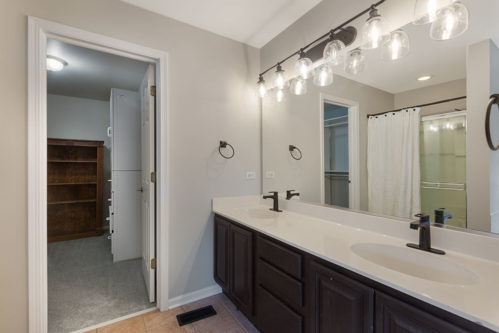 2020 Spring Creek Lane McHenry, IL 60050 - Photo 9 of 17 a bathroom with a double vanity sink mirror and shower