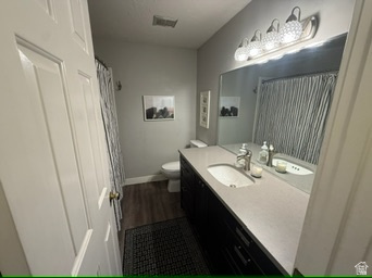 340 Willow Ridge Circle Centerville, UT 84014 - Photo 18 of 32 Single vanity with an integrated sink, polished chrome faucet, and a large mirror