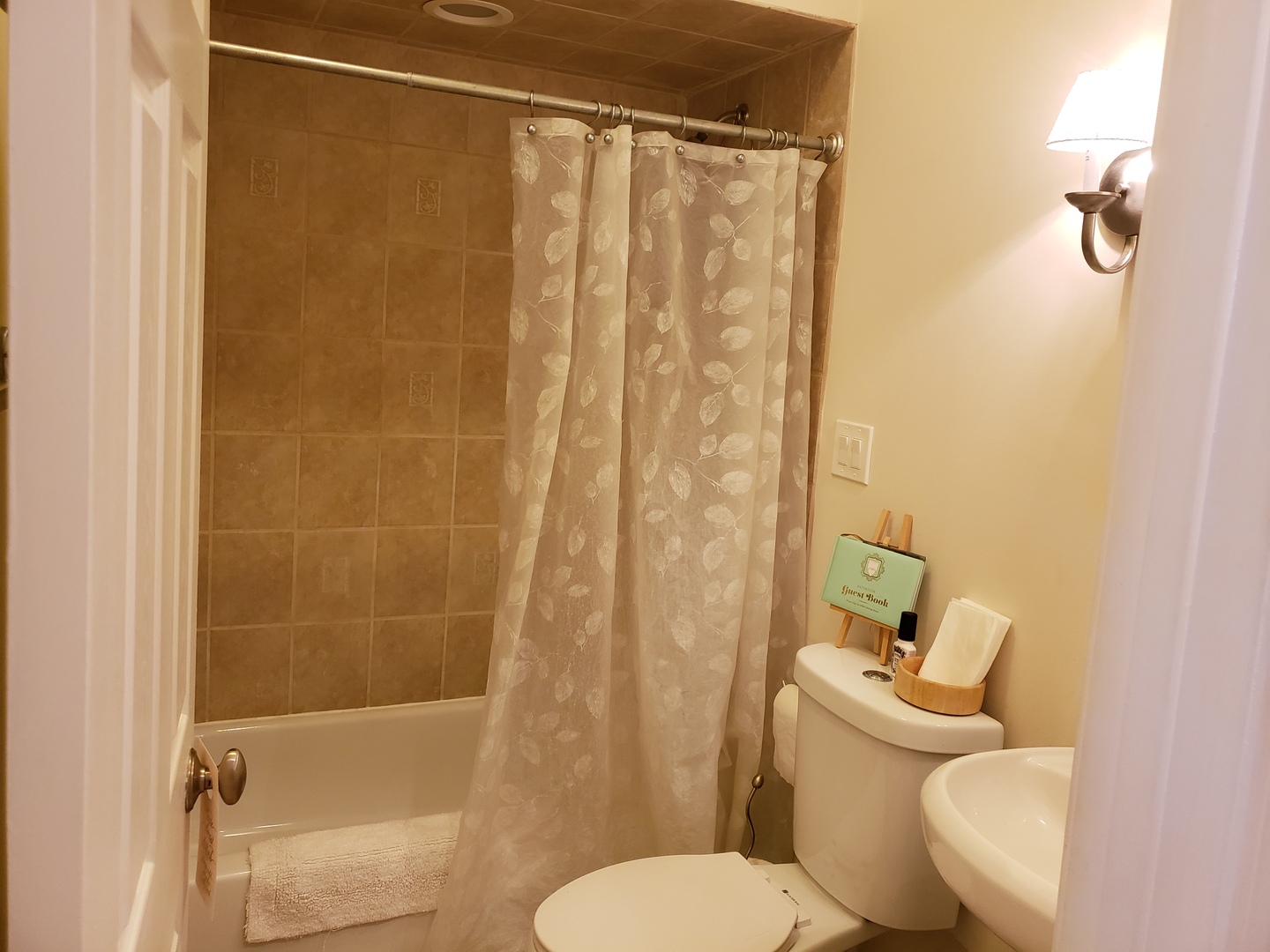 5946 South Prairie Avenue, Unit 2S Chicago, IL 60637 - Photo 13 of 18 a white toilet sitting next to a bathroom sink